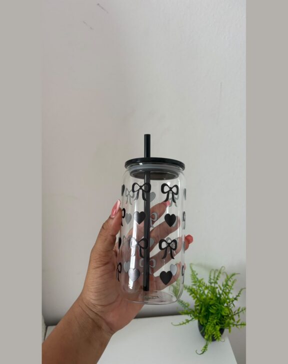 Glass can tumbler with lid and reusable straw.